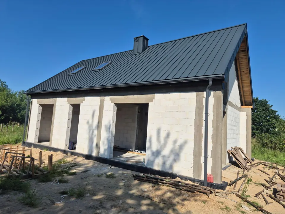 Pokrycie dachu i wykończenie okapu